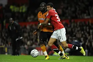 Man United V Wolves (Cup) Prints: Clash of the Titans: Bebe vs. Elokobi - Manchester United vs