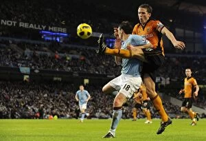Images Dated 15th January 2011: A Clash of Titans: Berra vs. Barry - Manchester City vs. Wolverhampton Wanderers