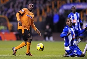 Wolves v Wigan Collection: A Clash of Titans: Ebanks-Blake vs Bramble - Wolves vs Wigan Football Rivalry