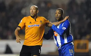Wolves V Wigan Prints: Clash of Titans: Iwelumo vs Bramble in the Barclays Premier League - Wolverhampton Wanderers vs Wigan Athletic