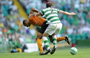 Images Dated 27th July 2011: Clash of Titans: Karl Henry vs. Adam Matthews - Celtic vs. Wolverhampton Wanderers Pre-Season