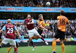 Kevin Doyle Prints: Clash of Titans: Kevin Doyle vs Carlos Cuellar - Wolverhampton Wanderers vs Aston Villa