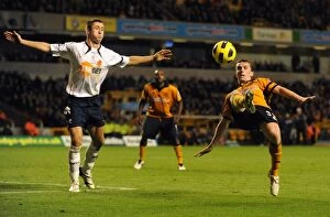Wolves v Bolton Collection: Clash of the Titans: Kevin Foley vs Gary Cahill - A Premier League Battle between Wolverhampton
