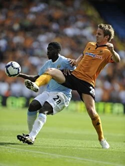 Images Dated 22nd August 2009: A Clash of Titans: Kolo Toure vs. Kevin Doyle - Manchester City vs. Wolverhampton Wanderers (2009)