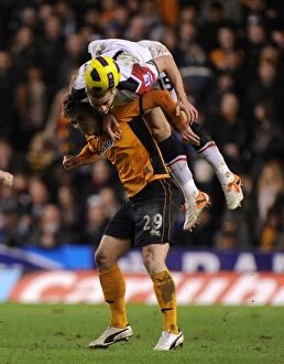 Images Dated 5th February 2011: A Clash of Titans: Wolverhampton Wanderers vs Manchester United - Kevin Doyle vs Nemanja Vidic