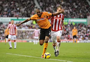 Stoke V Wolves Prints: Clash of Titans: Zubar vs. Whelan in the Intense Battle between Stoke and Wolves