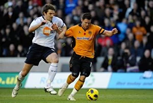 Wolves v Bolton Collection: Clash of the Wanderers: Matthew Jarvis vs. Sam Ricketts in Premier League Battle
