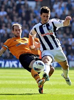 Images Dated 16th October 2011: Controversial Non-Call: Johnson vs. Long - Last Man Foul in West Bromwich Albion vs
