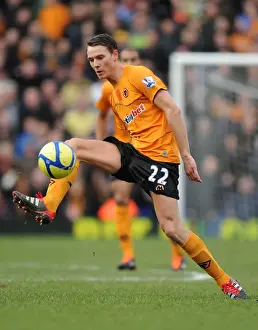 Determined Challenge: Eggert Jonsson of Wolverhampton Wanderers vs. Birmingham City in FA Cup Third Round