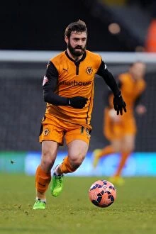 FA Cup - Third Round - Fulham v Wolves - Craven Cottage Collection: Determined Jack Price Leads Wolverhampton Wanderers in FA Cup Battle at Craven Cottage