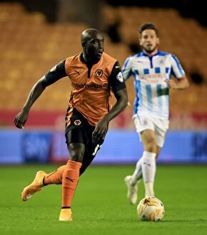 Sky Bet Championship - Wolves v Huddersfield Town - Molineux Collection: Determined Yannick Sagbo's Brilliant Performance: Wolves vs Huddersfield Town in Sky Bet