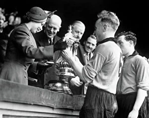Billy Wright Collection: FA Cup Final, Wolves vs Leicester City, Billy Wright presented with the trophy