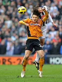 West Bromwich Albion v Wolves Collection: FA Cup Rivalry: Kevin Doyle vs. Jonas Olsson - Wolverhampton Wanderers vs. West Bromwich Albion