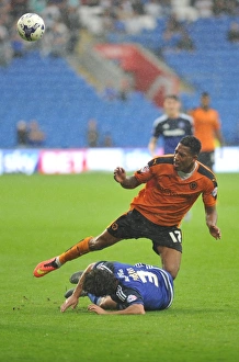 Fabio Da Silva vs. Rajiv Van La Parra: Intense Action in the Sky Bet Championship Clash between Cardiff City and Wolverhampton Wanderers