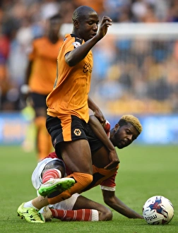 Framed Print : A Fight for Possession: Wolves vs Newport County in the Capital One Cup