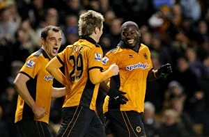 Images Dated 5th February 2011: George Elokobi's Dramatic 2-1: Wolverhampton Wanderers Stun Manchester United in the Premier League