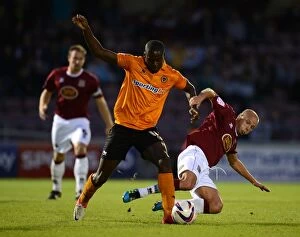 Images Dated 30th August 2012: Guttridge vs Nouble: A Battle in the Capital One Cup Clash between Northampton Town