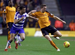Intense Battle for Championship Supremacy: Wolverhampton Wanderers vs. Reading - Wolves Kevin McDonald vs. Hal Robson-Kanu