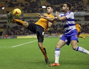 Wolves v Reading - Sky Bet Championship - Molineux Collection: Intense Battle for Supremacy: Batth vs. Robson-Kanu in Wolverhampton Wanderers vs
