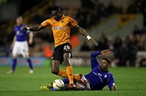 Images Dated 8th December 2012: Intense Championship Showdown: Tongo Doumbia vs. Hayden Mullins at Molineux