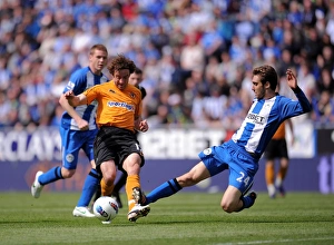 Intense Clash: Wolverhampton Wanderers vs. Wigan Athletic in Barclays Premier League