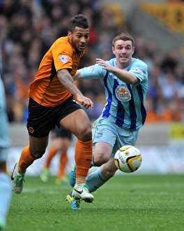 Sky Bet League One : Wolves V Coventry City : Molineaux Stadium : 19-10-2013 Prints: Intense Rivalry: Davis vs Fleck Battle for Ball in Wolves vs Coventry Sky Bet League 1 Clash (October 19)