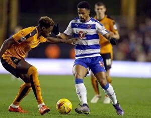 Wolves v Reading - Sky Bet Championship - Molineux Collection: Intense Rivalry: Dom Iorfa vs. Garath McCleary Battle in Wolverhampton Wanderers vs