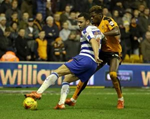 Wolves v Reading - Sky Bet Championship - Molineux Collection: Intense Rivalry: Domestic Battle Between Iorfa and Robson-Kanu in Wolverhampton Wanderers vs
