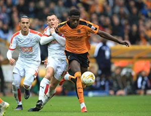 Framed Print : Intense Rivalry: Dominic Iorfa vs Harry Bunn Battle – Wolverhampton Wanderers vs Huddersfield Town Championship Clash Framed Print : Intense Rivalry: Dominic Iorfa vs Harry Bunn Battle – Wolverhampton Wanderers vs Huddersfield Town Championship Clash