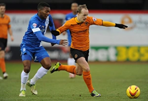 Sky Bet League One Prints: Intense Rivalry: Griffiths vs Nthle Battle in Wolverhampton Wanderers vs Peterborough United (Sky Bet League One)