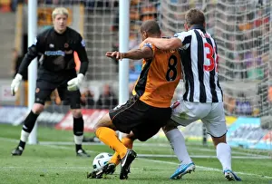 Player Prints: Intense Rivalry: Henry vs. Cox Clash in Wolverhampton Wanderers vs