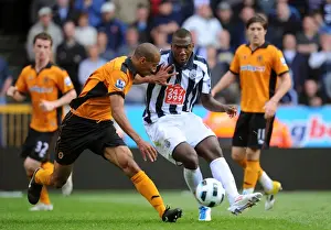 Player Prints: Intense Rivalry: Henry vs. Miller Clash in Wolverhampton Wanderers vs