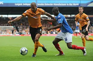 Portsmouth V Wolves Prints: Intense Rivalry: Henry vs. Sowah Clash in Portsmouth vs