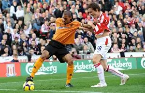 Stoke V Wolves Prints: Intense Rivalry: Henry vs Whitehead - Stoke City vs Wolverhampton Wanderers