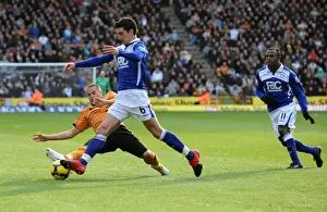 Wolves V Birmingham Prints: Intense Rivalry: Michael Kightly's Slide Tackle on Liam Ridgewell (Wolverhampton Wanderers vs Birmingham City)