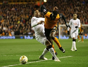 Sky Bet Championship - Wolves V Derby County - Molineux Stadium Prints: Intense Rivalry: Sako vs Christie Battle at Molineux Stadium - Sky Bet Championship Showdown