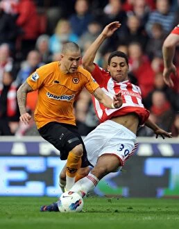 Wolves v Stoke City Collection: Intense Rivalry: Shotton vs. Kightly - The Unforgettable Tackle in Wolverhampton Wanderers vs