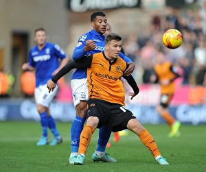 Soccer Wolves Prints: Intense Rivalry: Wolverhampton Wanderers vs Birmingham City - Battle for Championship Supremacy (Evans vs Davis)