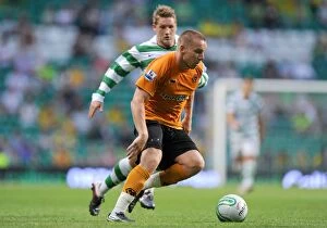 Celtic v Wolves Collection: Jamie O'Hara vs Chris Commons: A Fiery Pre-Season Clash Between Celtic and Wolverhampton Wanderers