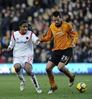Hull v Wolves Collection: Mancienne vs. Vennegoor-Hesselink: A Premier League Face-Off - Hull City vs. Wolverhampton Wanderers