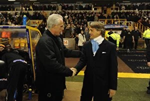 Images Dated 28th December 2009: Mancini vs. McCarthy: Wolves vs. Manchester City - Barclays Premier League Showdown