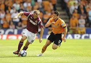 Wolves V West Ham United Prints: Mark Noble vs. Matthew Jarvis: A Premier League Battle at Molineux, August 15, 2009