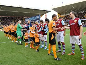 Wolves V Burnley Prints: Mascot Showdown: Wolves vs Burnley - Barclays Premier League