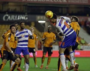 Wolves v Reading - Sky Bet Championship - Molineux Collection: Michael Hector's Header Attempt vs. Wolverhampton Wanderers in Sky Bet Championship (2014-15)