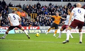 Wolves v Aston Villa Collection: Michael Kightly's Stunning Equalizer: 1-1 Draw for Wolverhampton Wanderers vs. Aston Villa