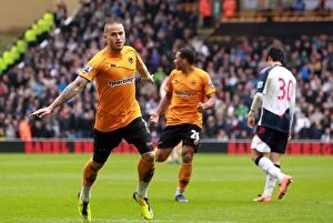 Wolves v Bolton Wanderers Collection: Michael Kightly's Stunning Goal: Wolves Stun Bolton in Premier League Opener at Molineux