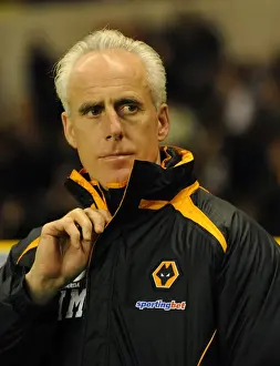 Past Player Prints: Mick McCarthy Leads Wolverhampton Wanderers Against Arsenal in the Barclays Premier League