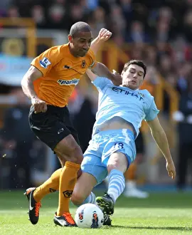 Wolves V Manchester City Prints: Midfield Showdown: Henry vs. Barry - Wolverhampton Wanderers vs. Manchester City