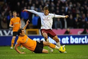 Images Dated 21st January 2012: Milijas vs. Petrov: A Midfield Battle in the Wolverhampton Derby - Barclays Premier League