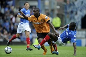Portsmouth v Wolves Collection: Mujangi Bia vs. Mokoena: A Battle in the Barclays Premier League - Portsmouth vs
